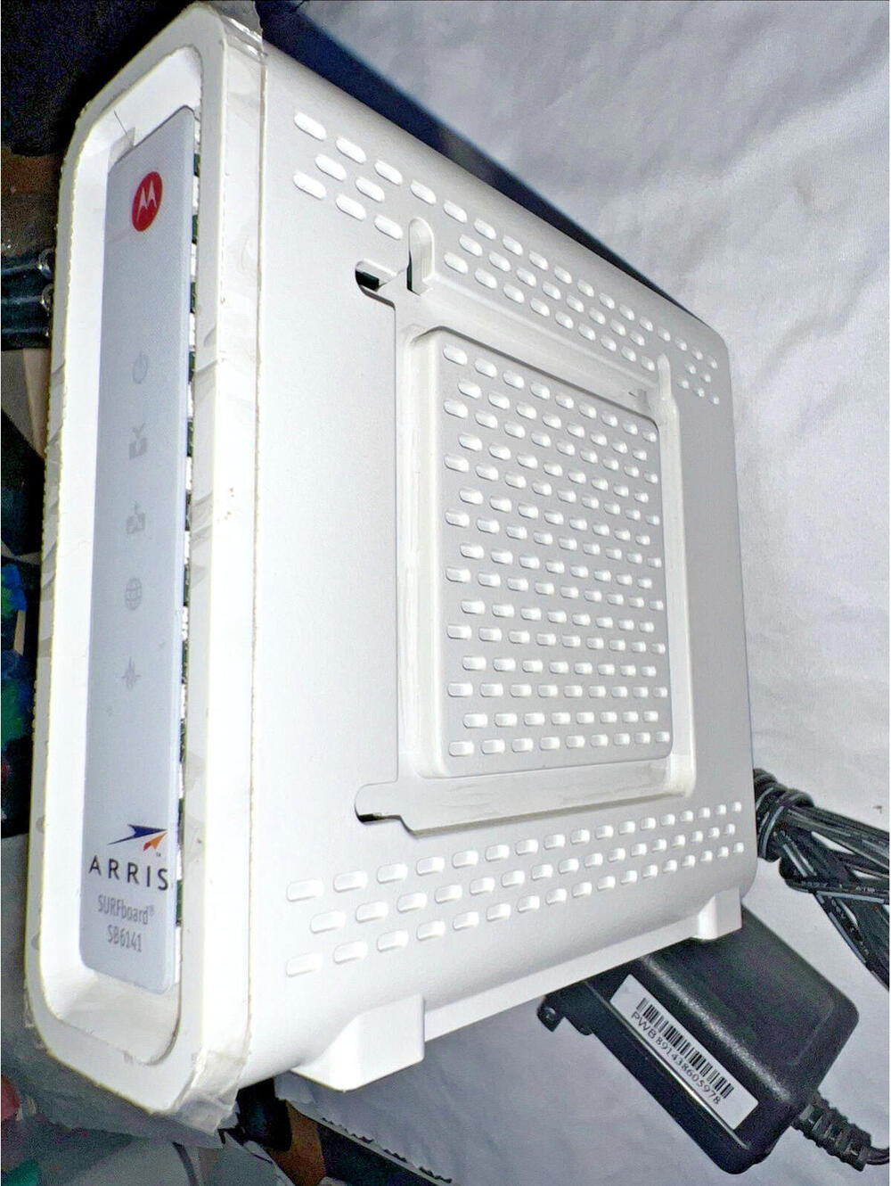 ARRIS SurfBoard Model SB6141 Cable Modem is a high-speed modem w/ Power Cord